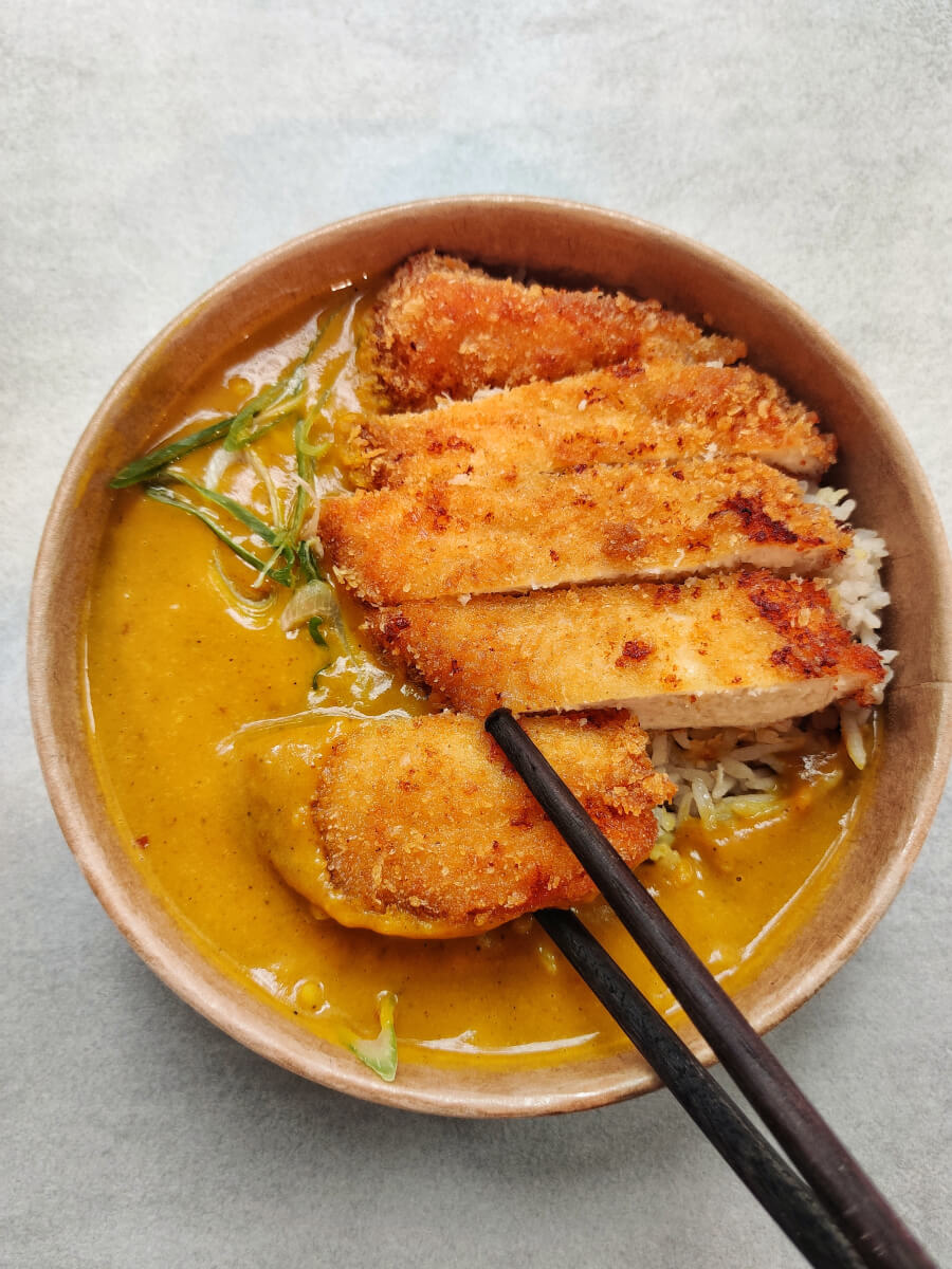 Top view of a bowl of Katsu curry